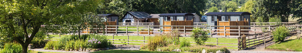 three shepherd huts set in the Yorkshire Dales